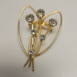 Elegant Gold and Silver Floral Brooch